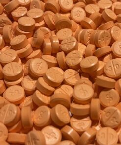 Adderall Purchase. Orange pills of Adderall